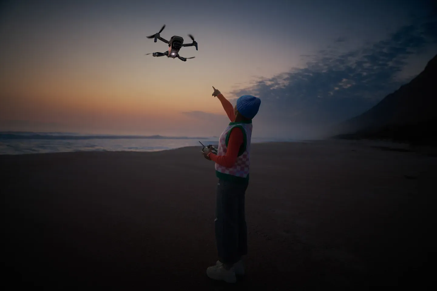 Aerial view of people walking along a beach